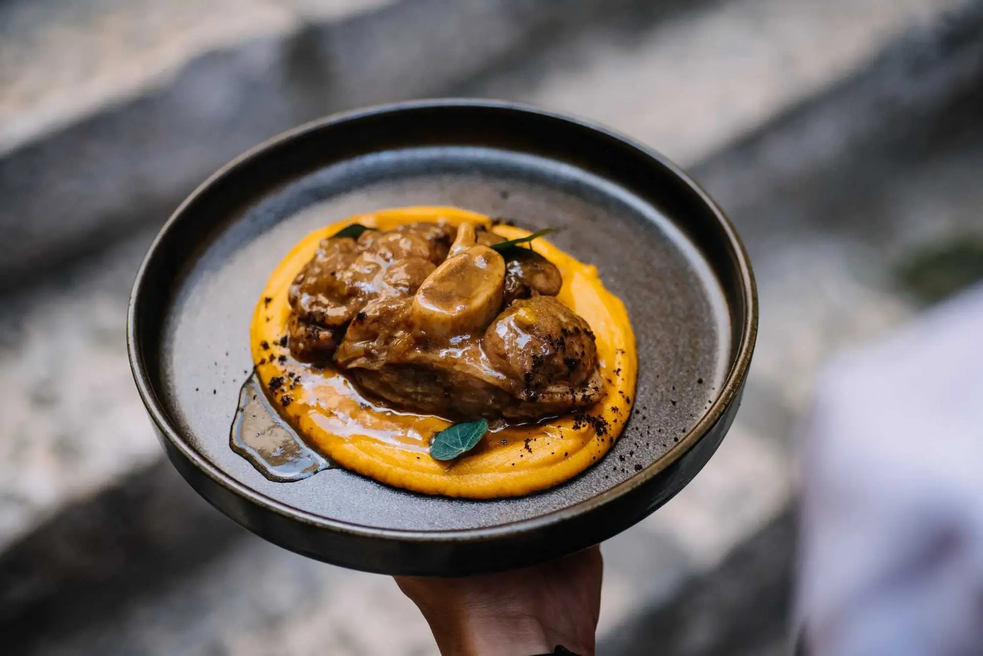 Signature dish with sauce at Lucin Kantun